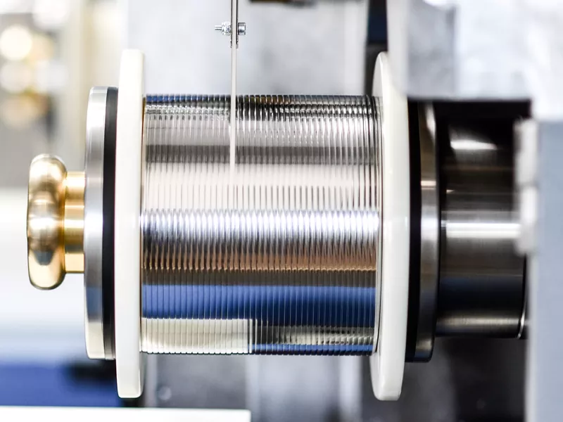 GRM round wire rolling mill - PV ribbon spool for solar applications